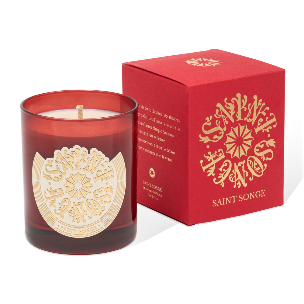 Bougie parfumée Saint Songe de 180 grammes dans son pot en verre rouge et son étiquette ivoire et or