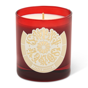 Bougie parfumée Saint Songe de 280 grammes dans son pot en verre rouge et son étiquette ivoire et or
