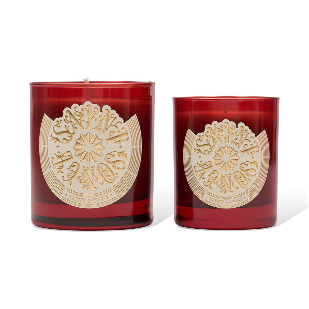Bougie parfumée Saint Songe de 180 grammes dans son pot en verre rouge et son étiquette ivoire et or